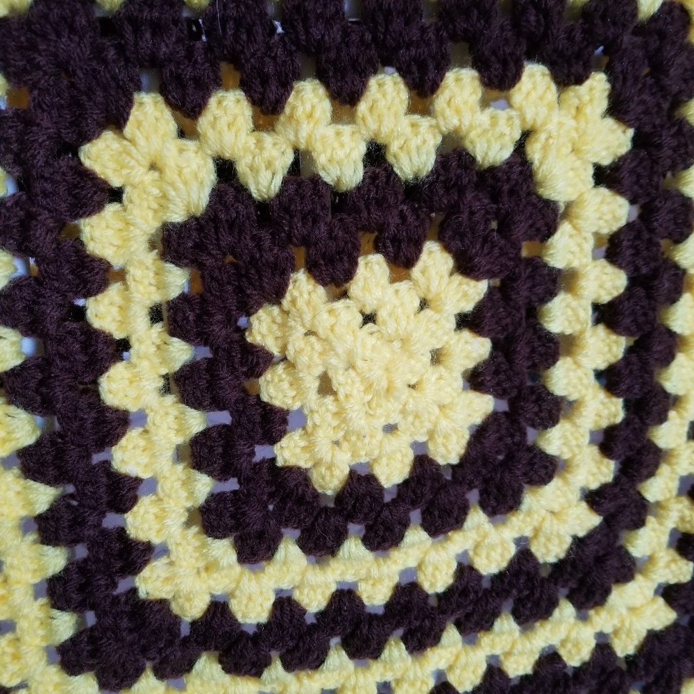 Handmade crocheted infant blanket